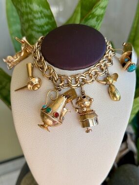 14 and 18 karat gold charm bracelet